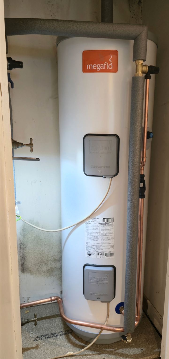 Unvented cylinder in a cupboard